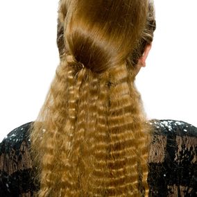 Los haar met krullen in onderste helft